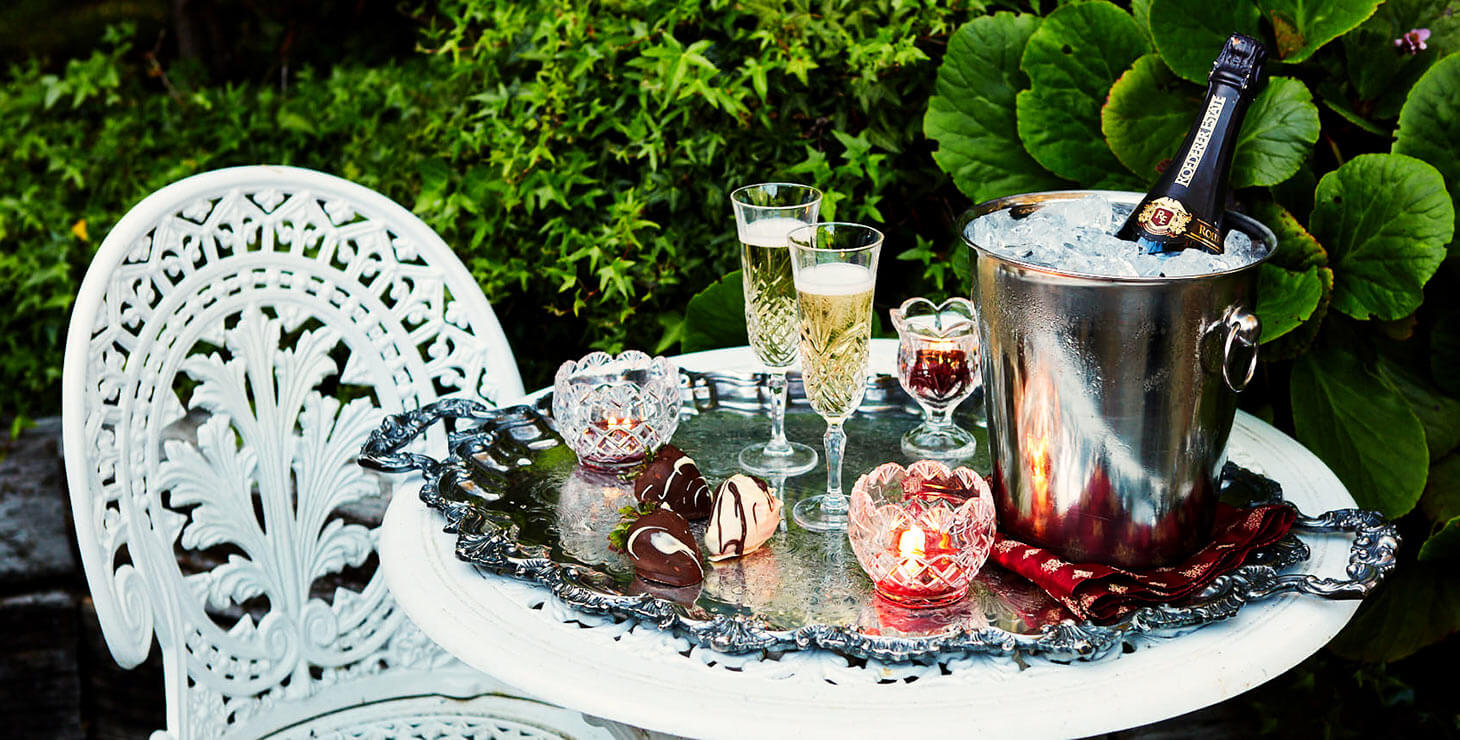 Mendocino Getaway - Chocolate covered strawberries and champagne on a table