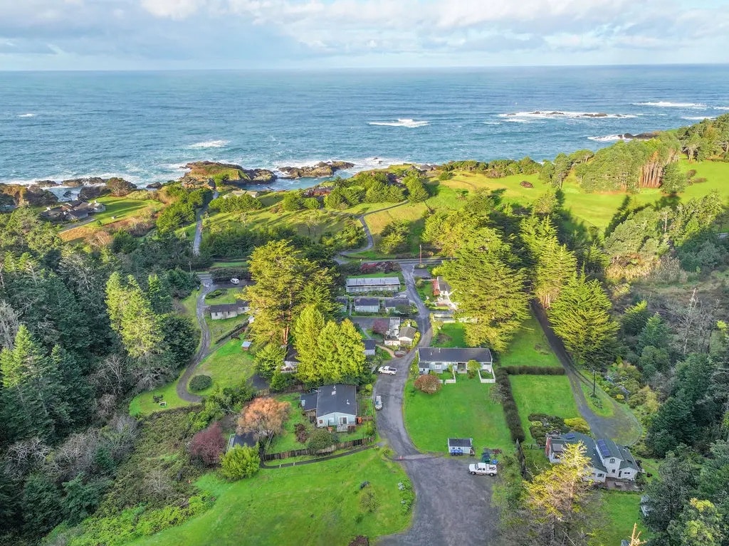 Aerial view of an inn property along the Mendocino coast in Little River, California - featured in Dennen's Victorian Farmhouse Inn June stay special